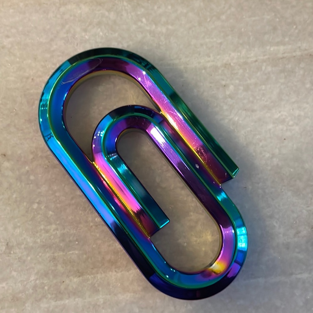 Iridescent paper weight